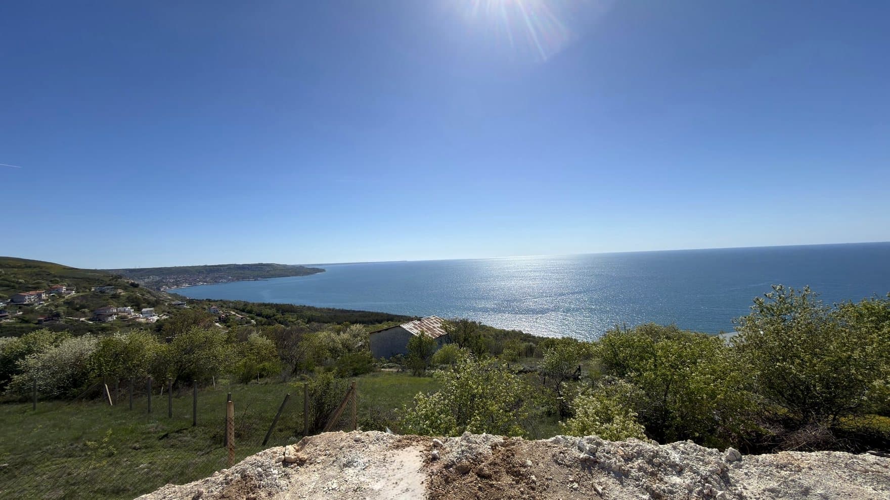 The real Black Sea view from the Marevanta plot near Balchik, the bay curving toward the coast